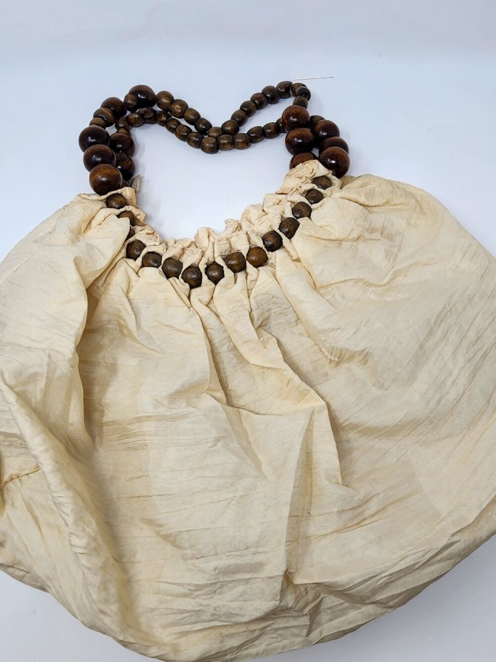 New ivory sling cloth bag with dark brown and grayish brown bead handle